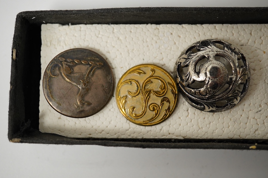 Six assorted late 19th/early 20th century buttons;, Condition - good